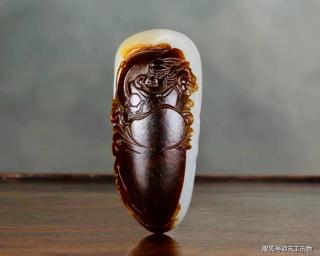 最老熟的和田玉!黑皮籽料巧雕"韦陀"!